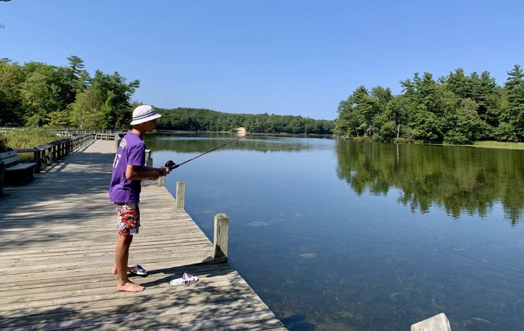 Kids love to fish off Beechwood Campground boardwalk at Ludington State Park